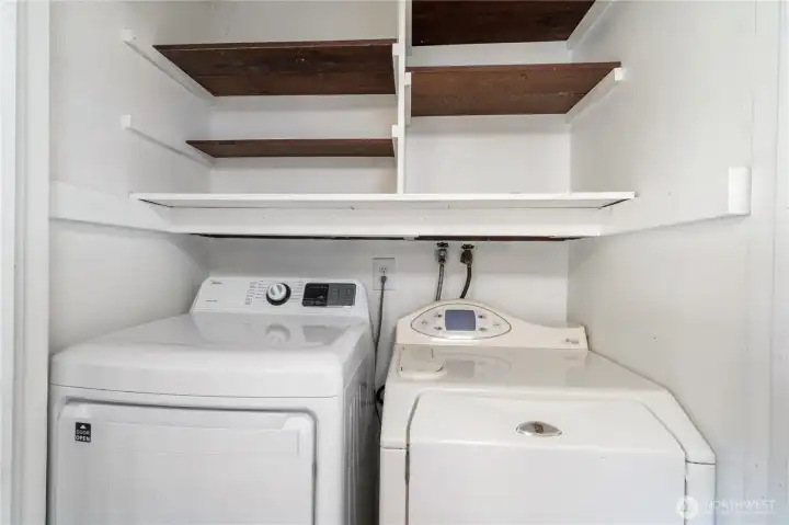 Laundry off kitchen with extra storage