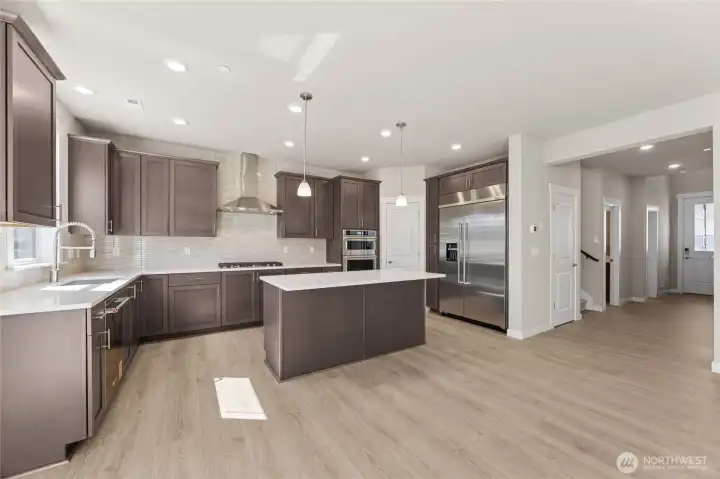 Showing plan without staging, home will include white cabinetry.