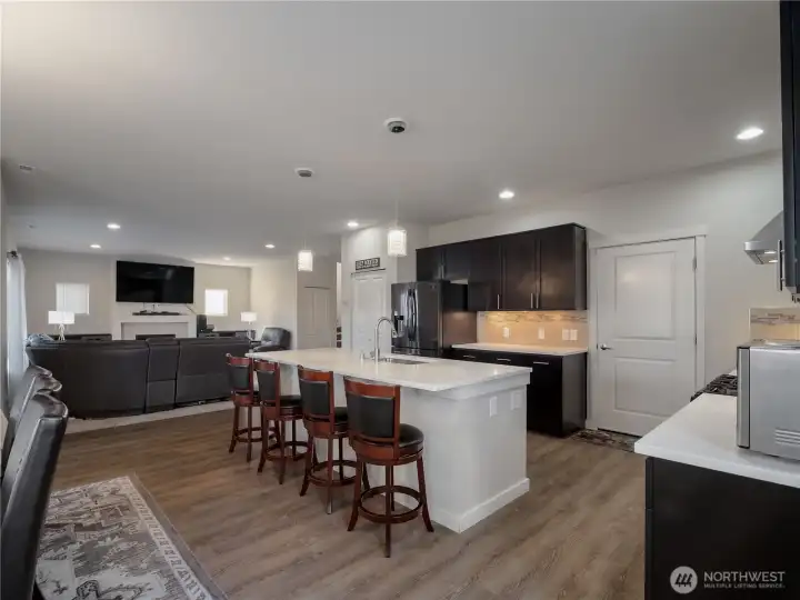 Spacious downstairs living area providing plenty of room for relaxation, entertaining, and daily living.