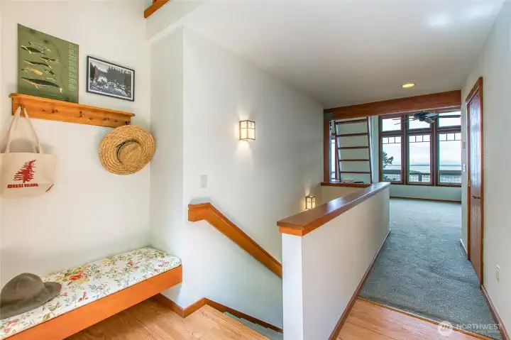 Foyer with charming bench.  To the right, out of sight in this photo, is a coat closet.