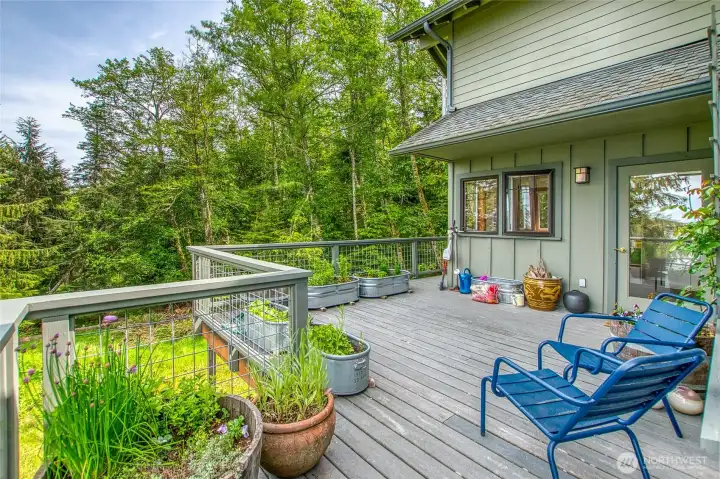 East side deck used as herb garden but could be excellent hot tub location.