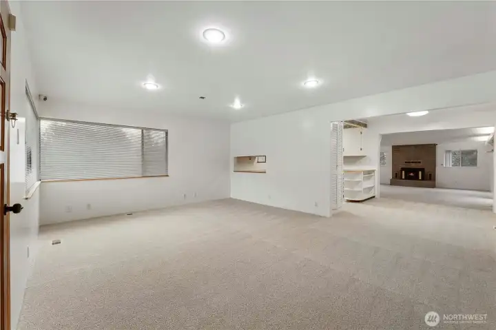 Incredible flow to this home's layout with natural lighting from large picture windows!