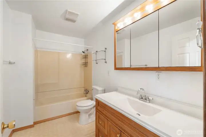 Roomy bathroom offering a solid base with room to update.