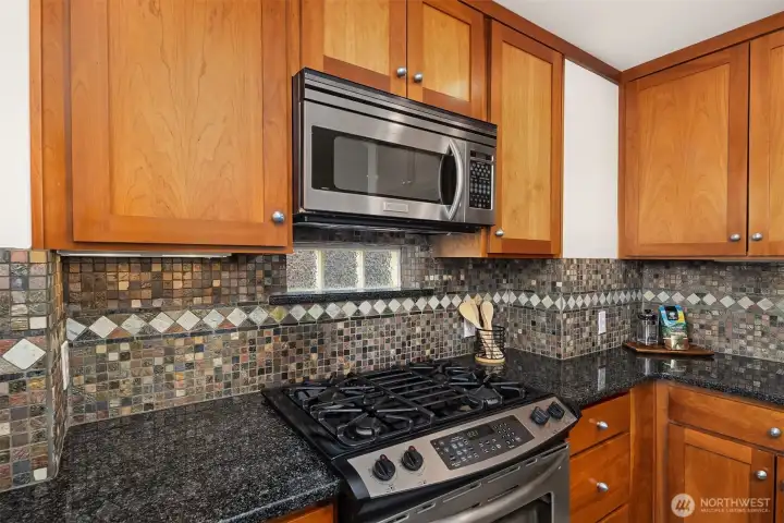 Treat the cook to a natural gas range with glass block window for extra light.