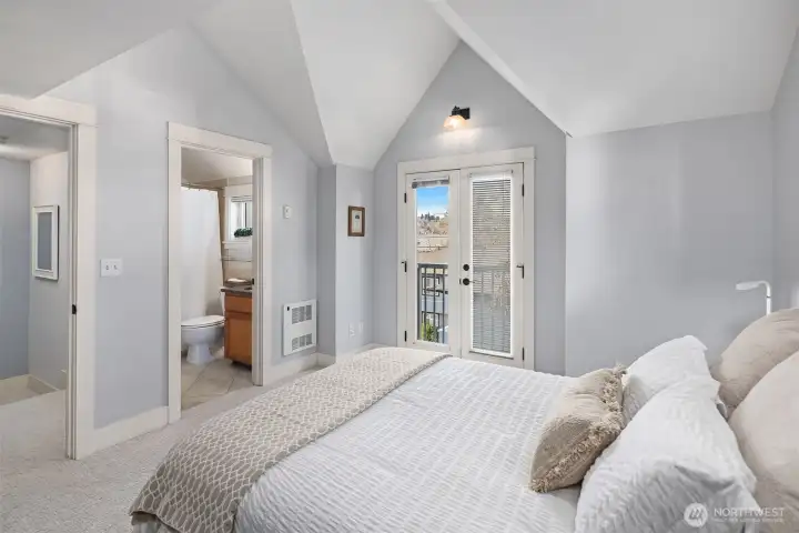 Crowned by a cathedral ceiling, with its own en-suite bath.