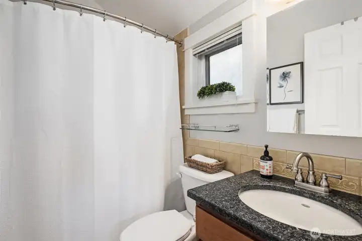 Full en-suite bath in the primary suite.