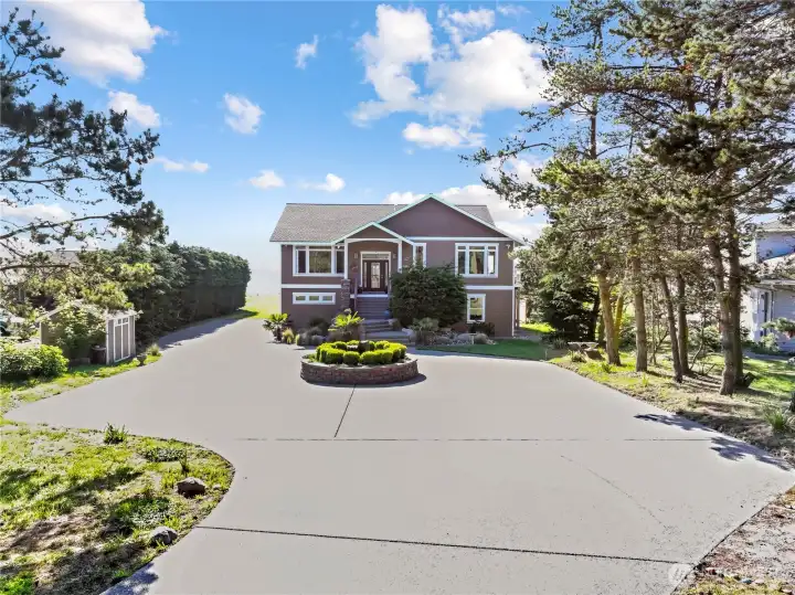 Gracious circular driveway and entry