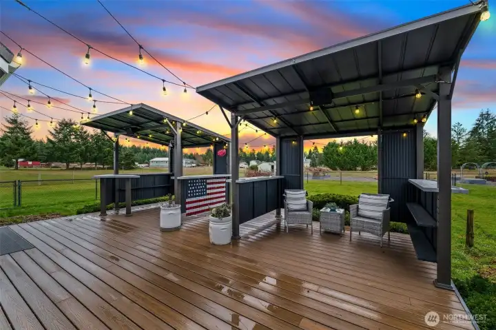 This deck is the perfect place to grill, complete with bistro lights for ambiance