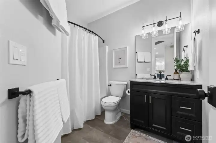 With a shared full bathroom in between