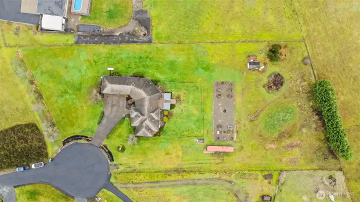 The 2+ acre property is flat and generous, with a fully fenced inner-perimeter the yard comes dog-friendly allowing for the ADU or detached garage/shop of your dreams
