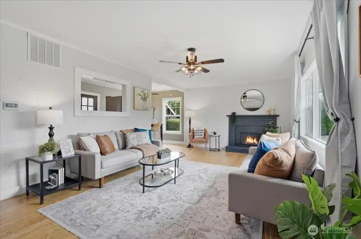 Light-filled living room with gas fireplace