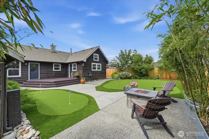 Astro turf yard set as a putting green.