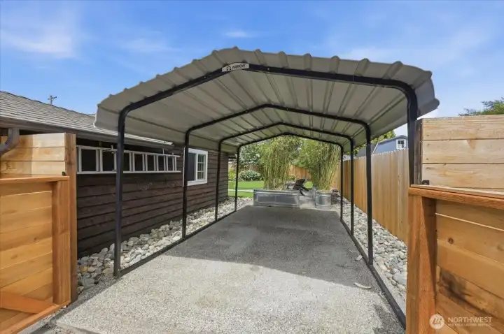 More covered parking is available under the carport.