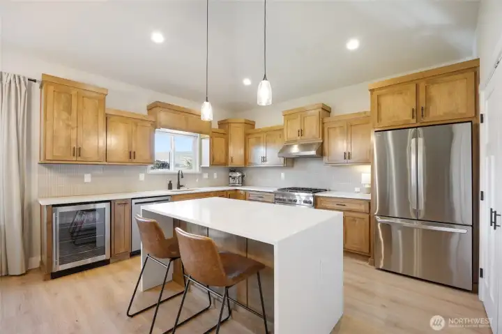 Quartz counters and waterfall island, new appliances Quartz counters and waterfall island, new appliances