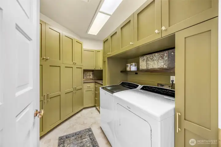 Laundry room custom with pull out drying racks & ironing board Laundry room custom with pull out drying racks & ironing board