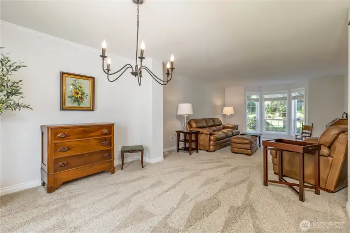 Formal dining and living rooms provide easy entertainment space.