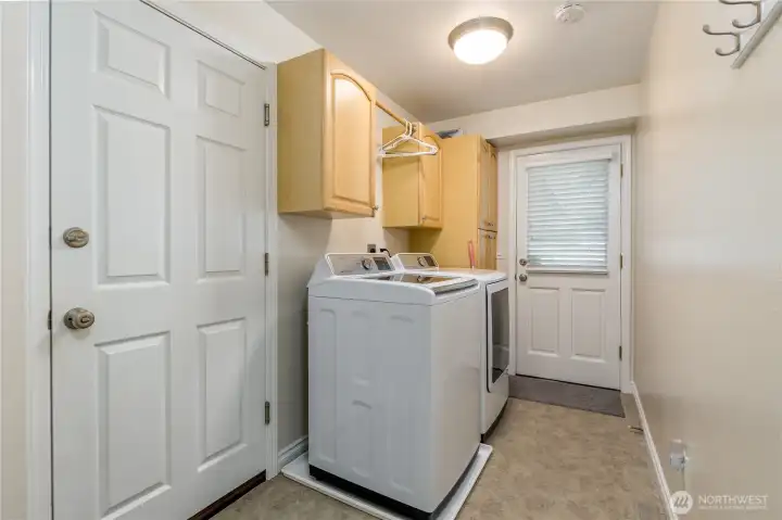 Laundry/mudroom provides direct access to both the 3-car garage and the side yard.