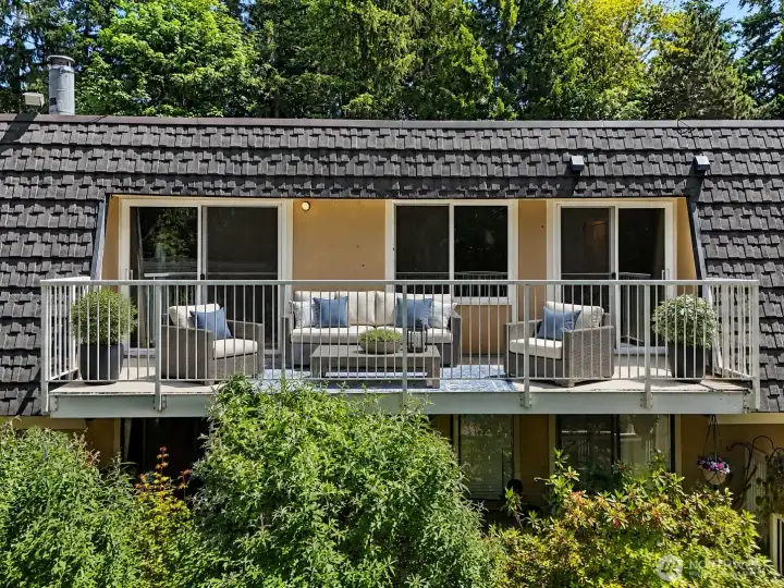 Virtually staged Condo balcony that overlooks the pool and greenbelt