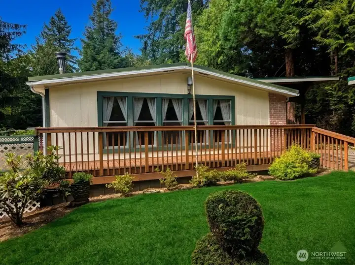 Nestled in the quiet peaceful woods with a wrap-around deck Nestled in the quiet peaceful woods with a wrap-around deck