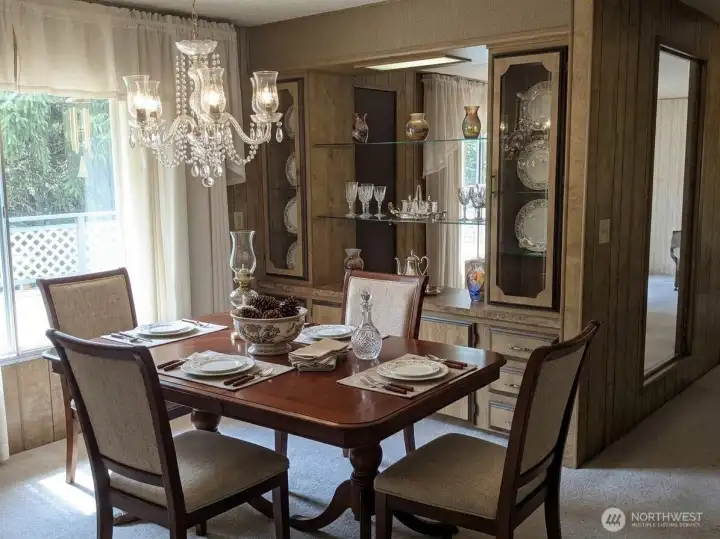 Formal dining room leads out to deck (virtually staged) Formal dining room leads out to deck (virtually staged)