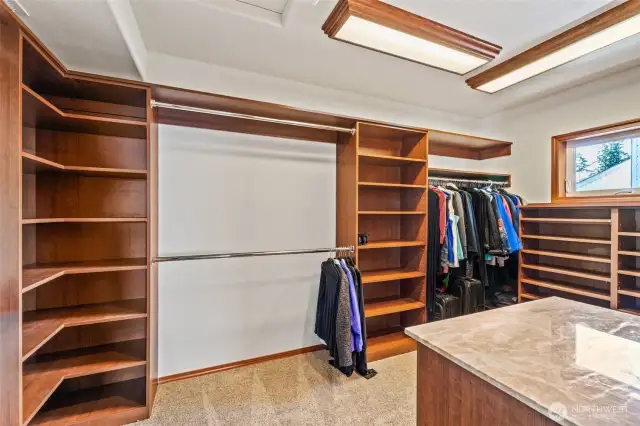 Primary suite with two large walk-in closets.