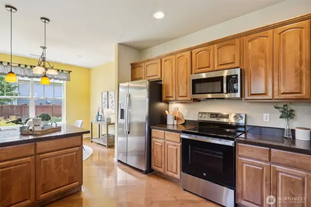 Sile Stone Countertops with backsplash. Pendant lighting.