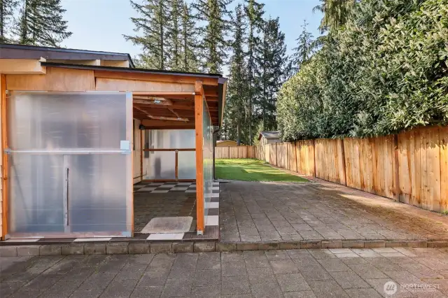 Large patio space and covered/enclosed space.