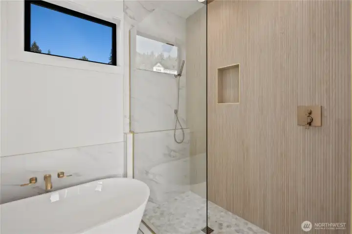Big dual head shower & soaking tub.