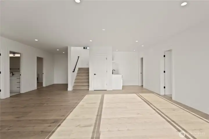 Downstairs, enjoy oversized rec/bonus room...