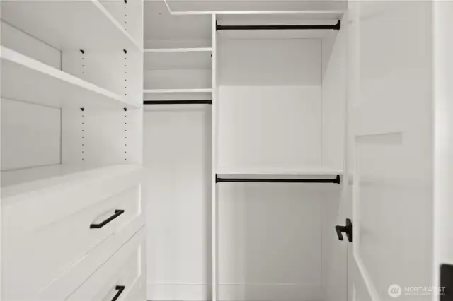 & walk-in closet w/custom cabinets!