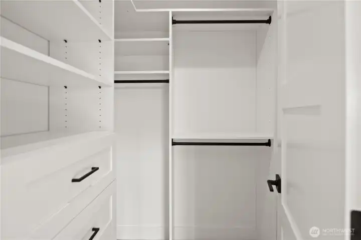 & walk-in closet w/custom cabinets!