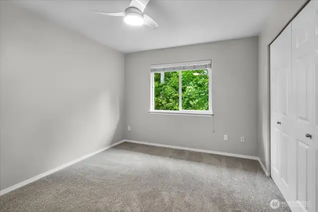 There are 2 additional bedrooms on the same floor. Both have ceiling fans and large closets.
