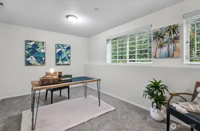 This is the room on the garage level. It could be a forth bedroom or a play room or an office. So much fresh paint!