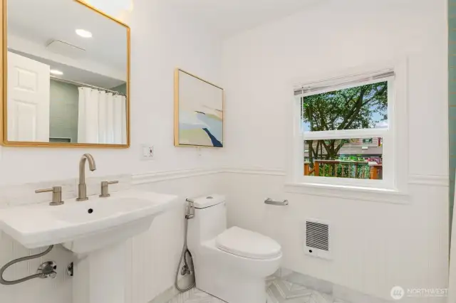 Bathroom with shower attached to the main floor suite