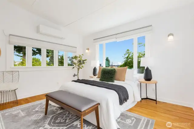 Upstairs primary suite with Mt. Rainier and city light views