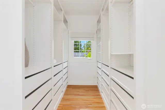 Walk-in closet of upstairs primary suite