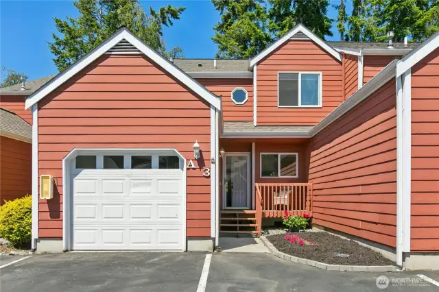 Front of home with 2 parking spaces directly in front of the unit.