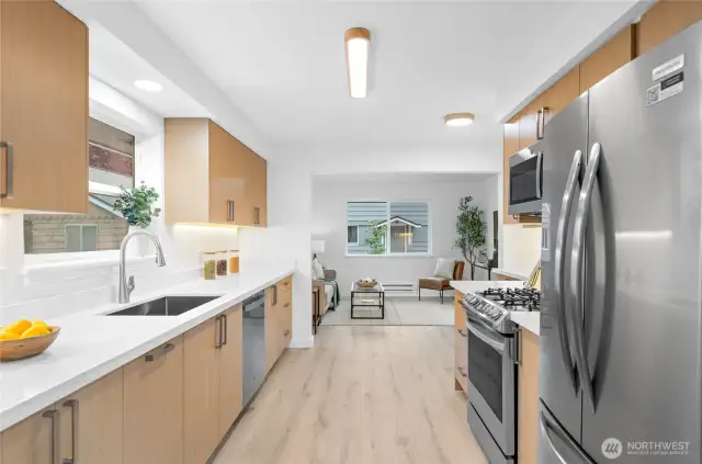 Stylish new luxury vinyl plank flooring throughout the main level.