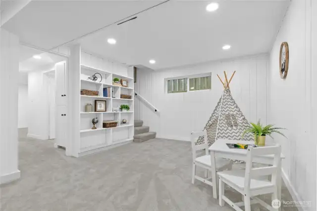 Lower-level bonus room offers flexible space for guests or relaxed living.