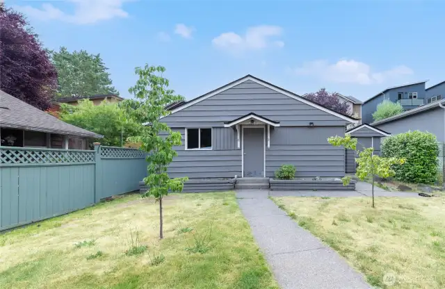 An expansive backyard offers a rare combination of privacy and opportunity in the city… also Honeycrisp apple, plum and Dogwood trees!