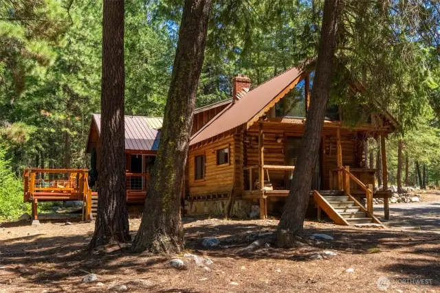 The home incorporates the original 1980s-era log cabin with stone foundation that was renovated and expanded in 2002.