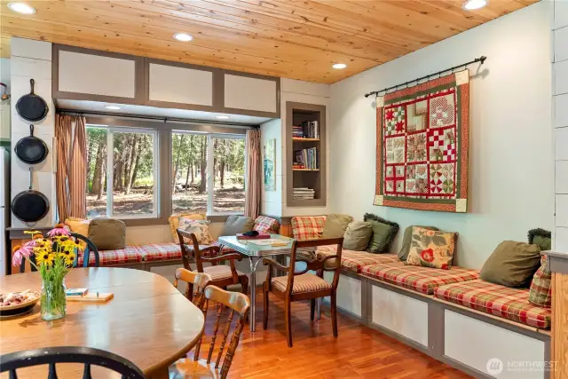 Built-in daybeds with storage below and plenty of natural light create the perfect hangout space. Relax at the cabin!