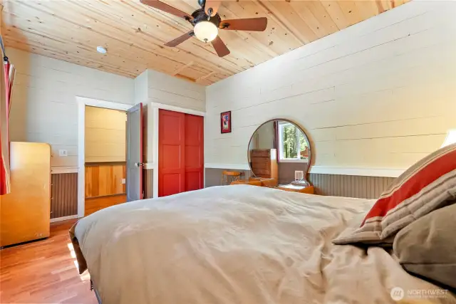 The bedroom has a built-in closet and lots of room for additional furniture.