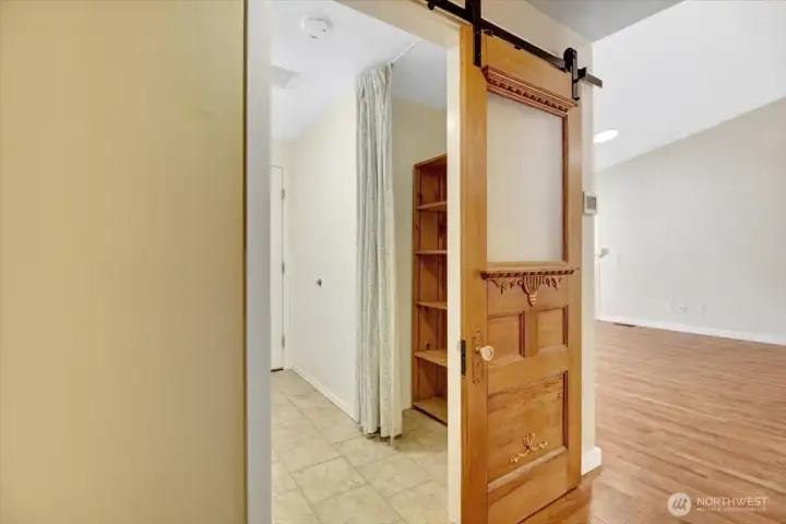 Custom "barn" door leading into the laundry/utility room.  Lots of extra storage.
