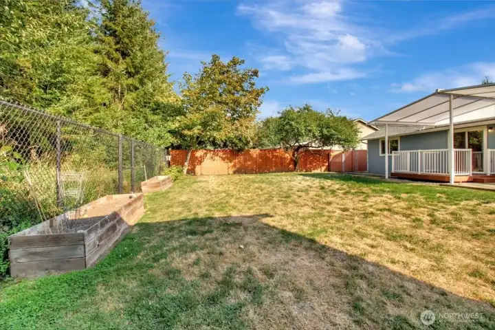 Backyard is fully fenced.  Back fence allows a view into the greenbelt behind the house.