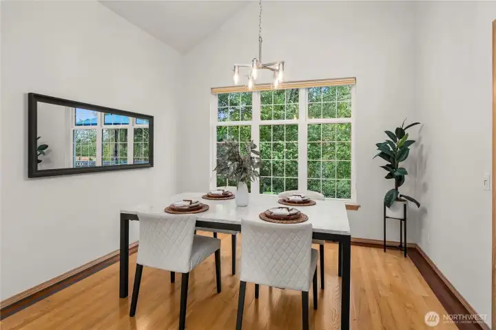 Formal dining room with soaring vaulted ceilings—perfect for memorable gatherings.