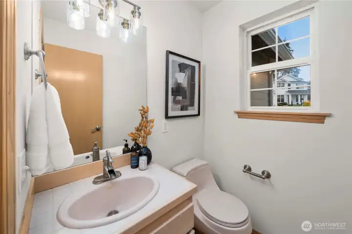 Well-appointed guest bath located downstairs for easy access and comfort.