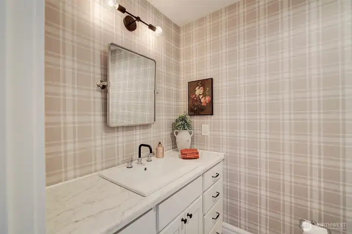 Second level half bath attached to bonus room