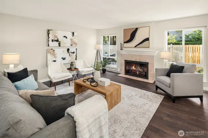 New LVP flooring throughout and cozy fireplace in oversized living room.