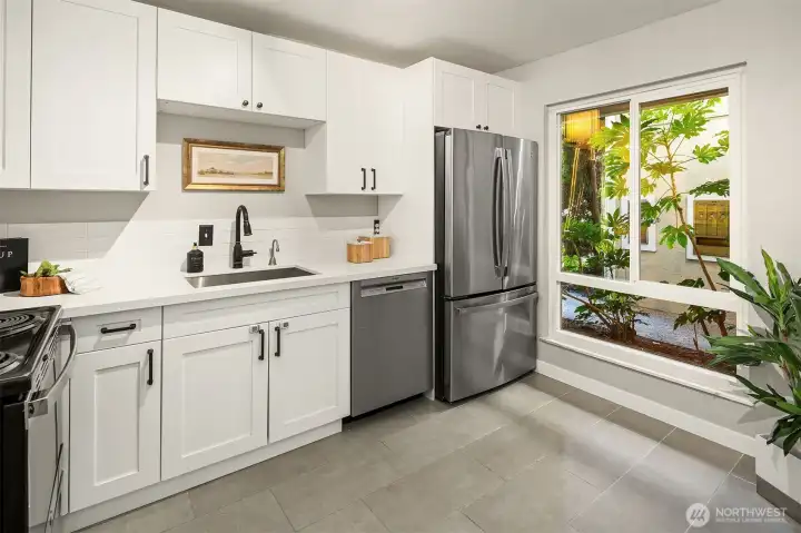 Ample space for rolling island and oversized window to bring in natural light!